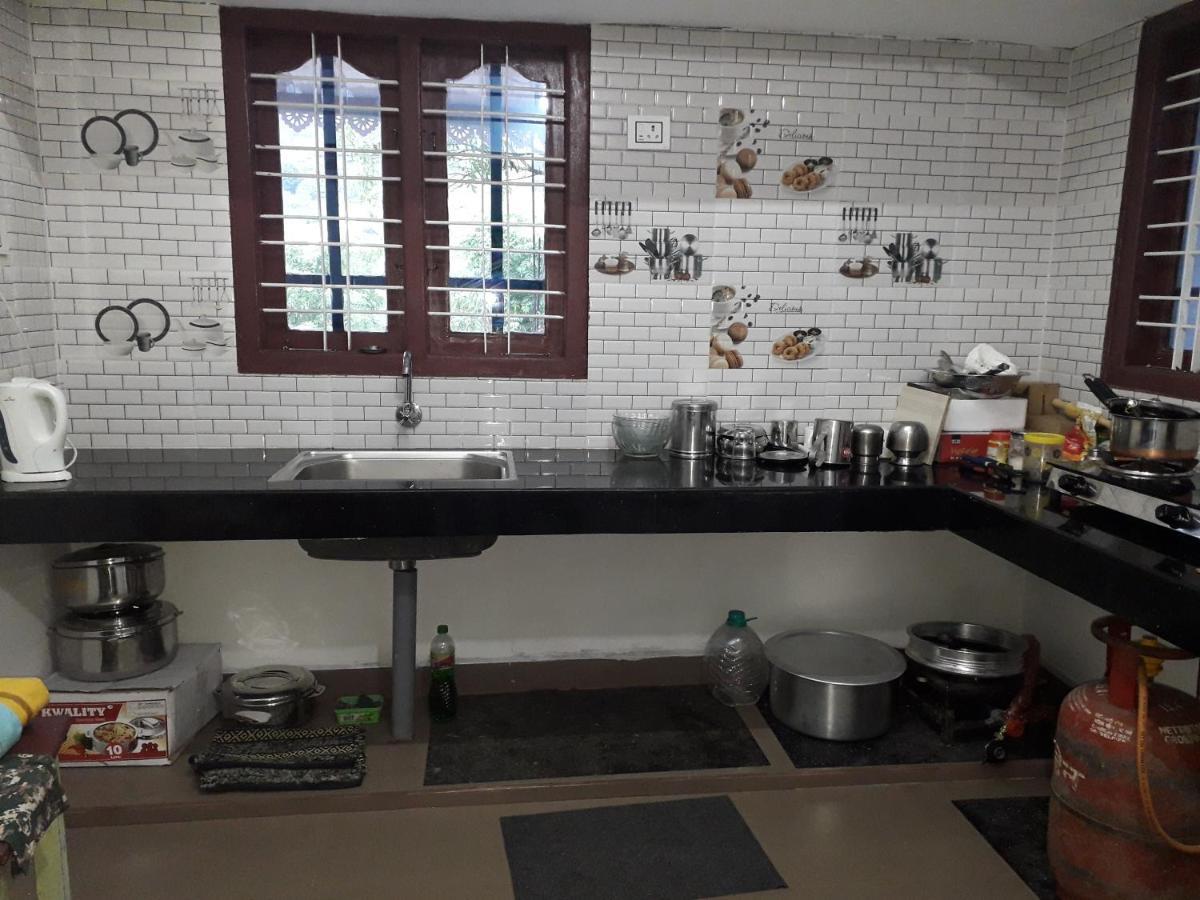 Munnar Brindavan Cottage Экстерьер фото